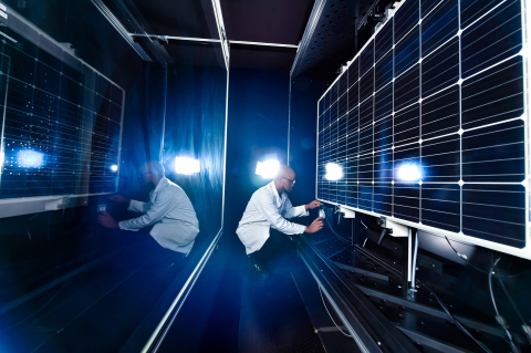 person looking at machine